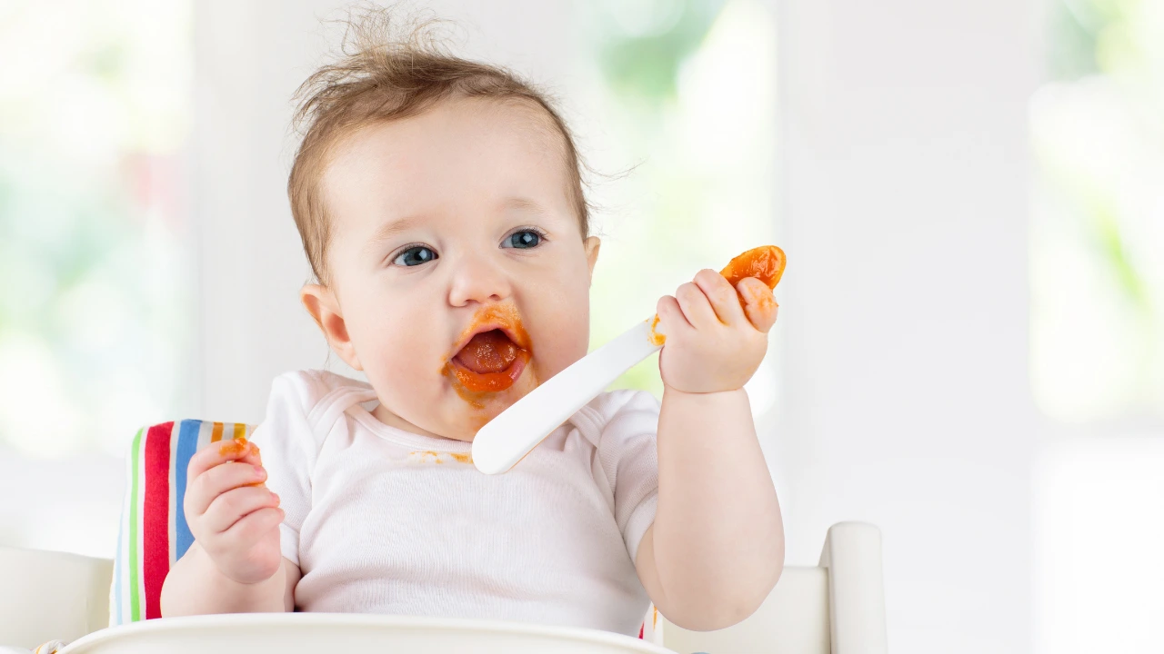 Baby eating cereal