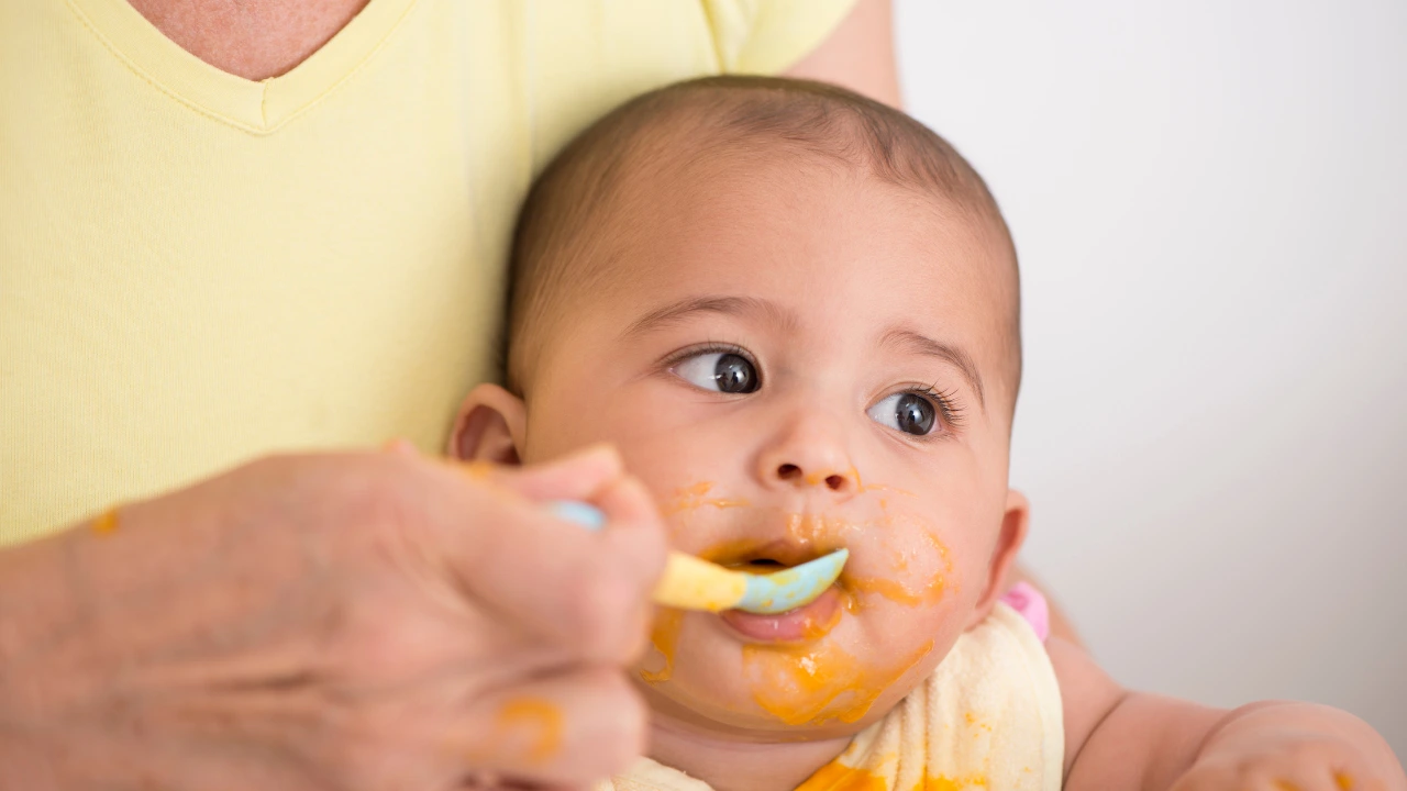 Baby eating spicy food