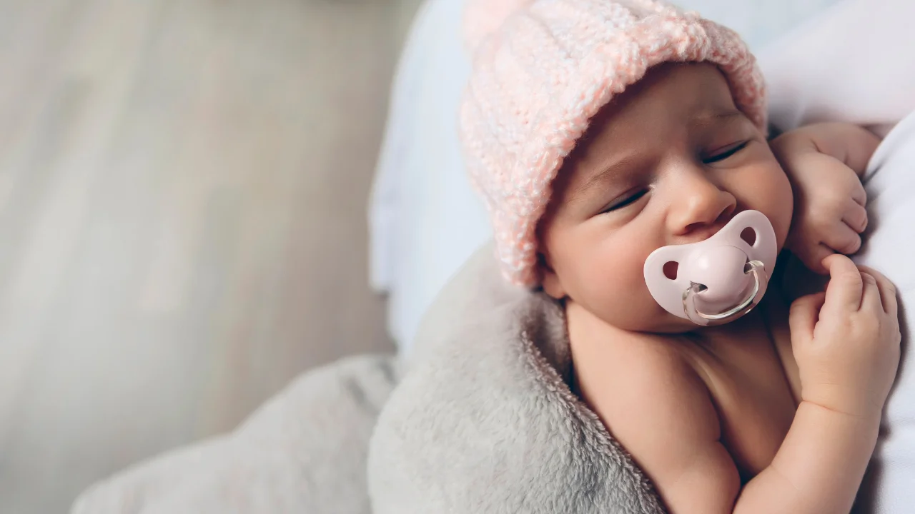 Can newborns and babies sleep with pacifiers?