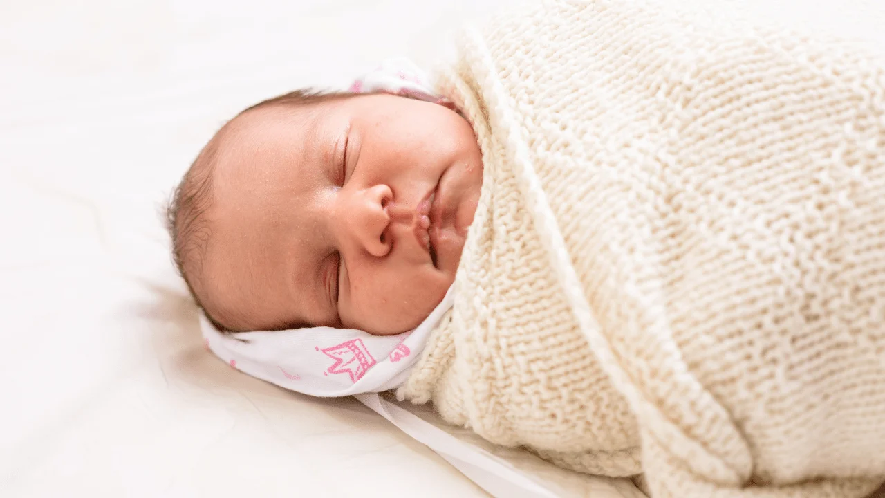 Why your newborn sleeps all day